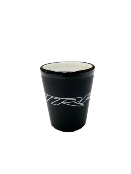 TRP branded shot glass on white background
